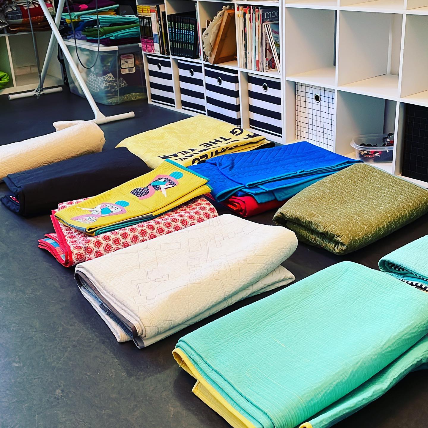 Picking out quilts for an upcoming show. So many to choose from…